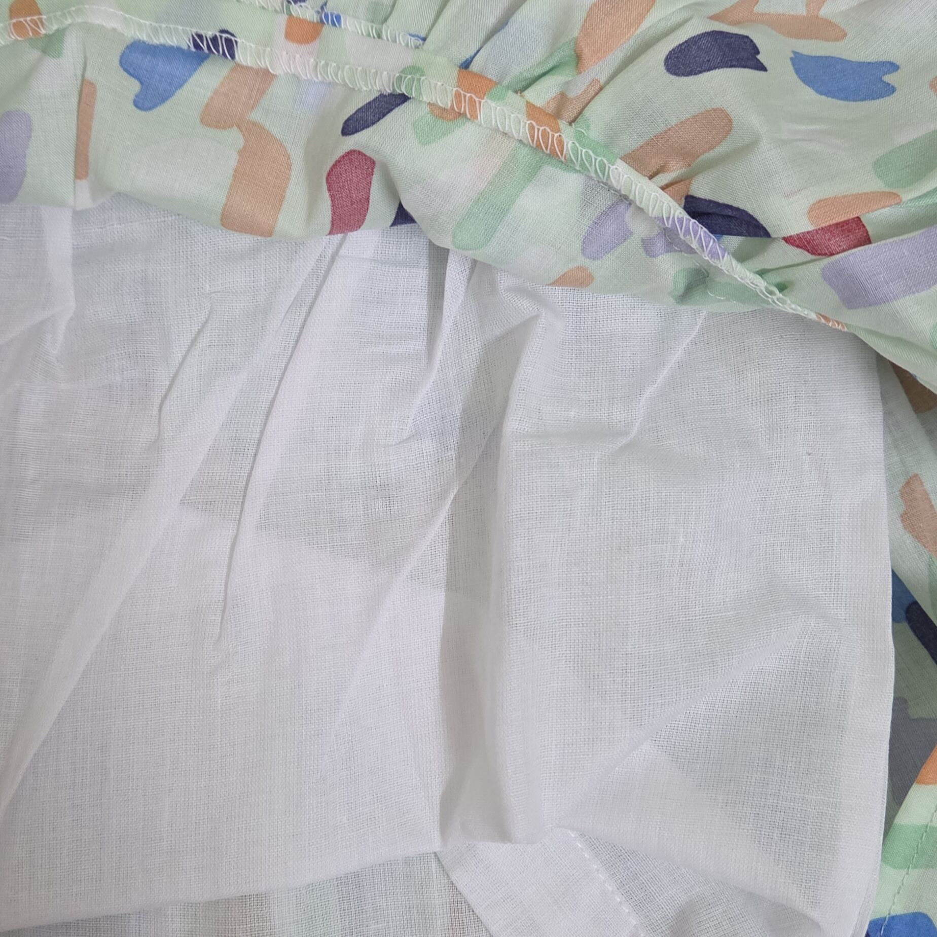 Close-up of a colorful fabric with heart patterns inner .