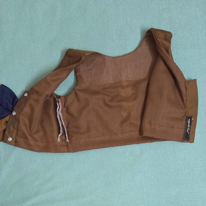 Brown jacket on a light blue background